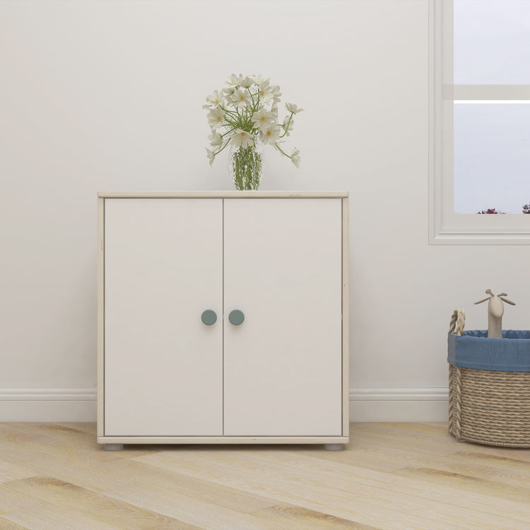 Flexa. Classic cupboard with light teal knobs  - White washed