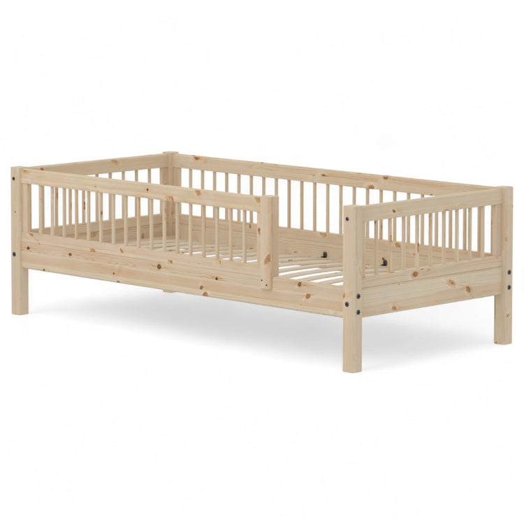 Flexa. CLASSIC bed with backrest, head- and foot board and 3/4 safety rail. Use it for your toddler, who just has grown out of the baby bed. The bed is crafted from solid pinewood.