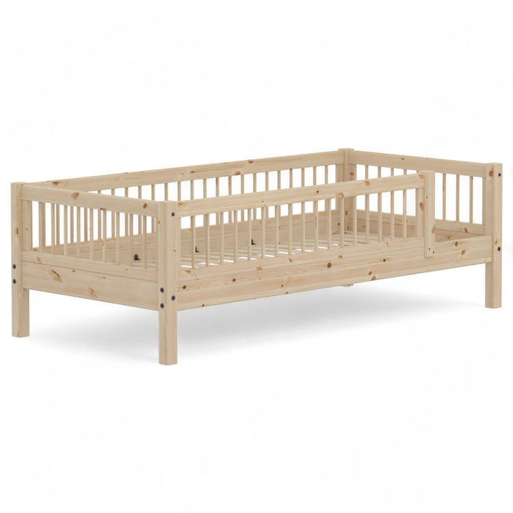 Flexa. CLASSIC bed with backrest, head- and foot board and 3/4 safety rail. Use it for your toddler, who just has grown out of the baby bed. The bed is crafted from solid pinewood.