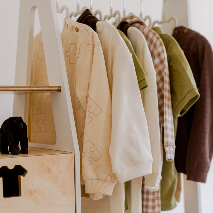 Duck Woodworks. Clothing rack with drawers and clothes shaped handles white