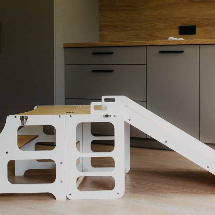 Duck Woodworks. Montessori foldable kitchen tower with slide white