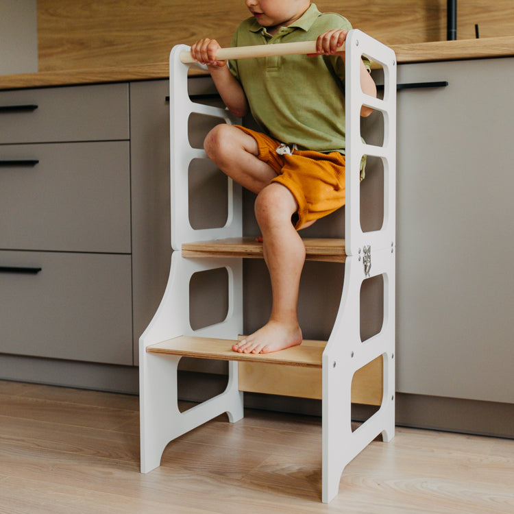Duck Woodworks. Montessori foldable kitchen tower with slide white