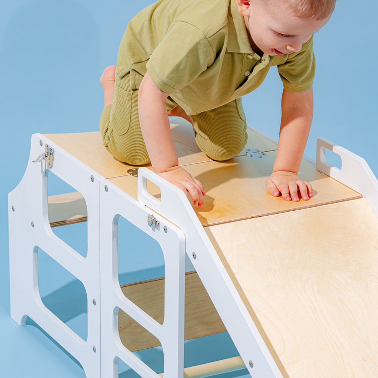 Duck Woodworks. Montessori foldable kitchen tower with slide white