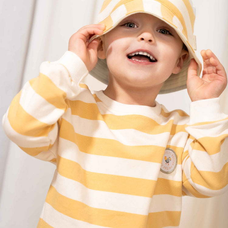 LITTLE DUTCH. Παιδικό καπέλο ήλιου διπλής όψης Honey Stripes / Farm Green