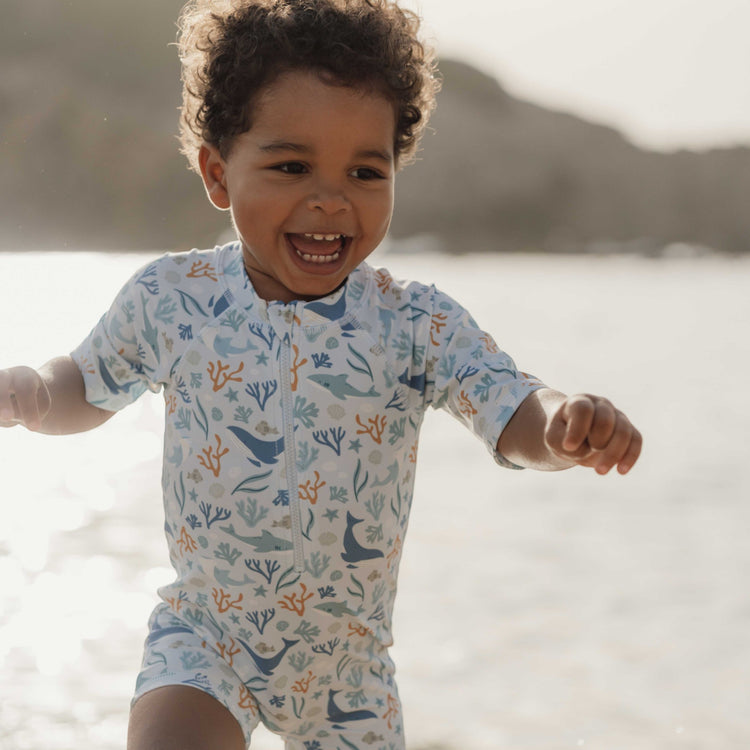 LITTLE DUTCH. Swimsuit short sleeves Ocean Dreams Blue - 98/104