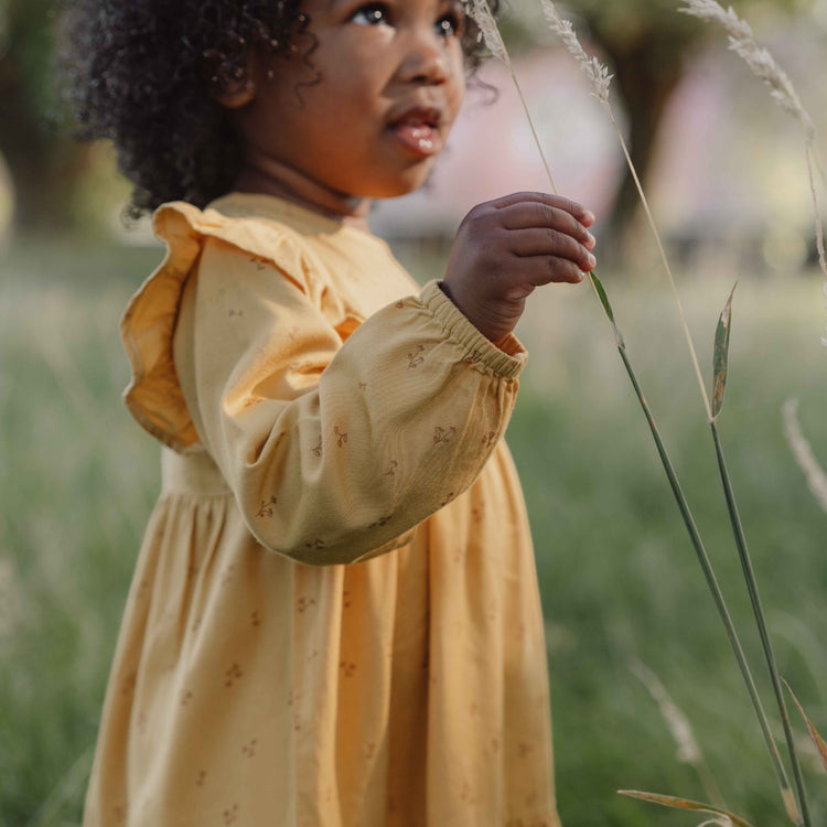 LITTLE DUTCH. Φορεματάκι μακρυμάνικο με βολάν Warm Yellow Blooming Flower