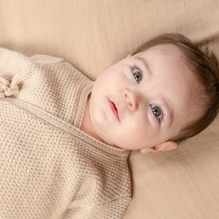 LITTLE DUTCH. Knitted one-piece wrap suit Sand