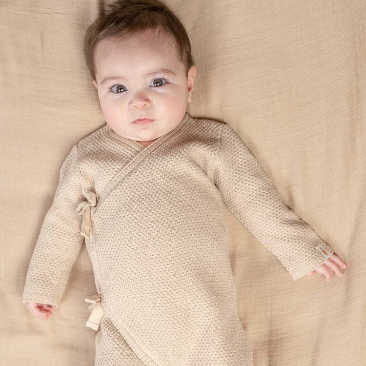 LITTLE DUTCH. Knitted one-piece wrap suit Sand - 62