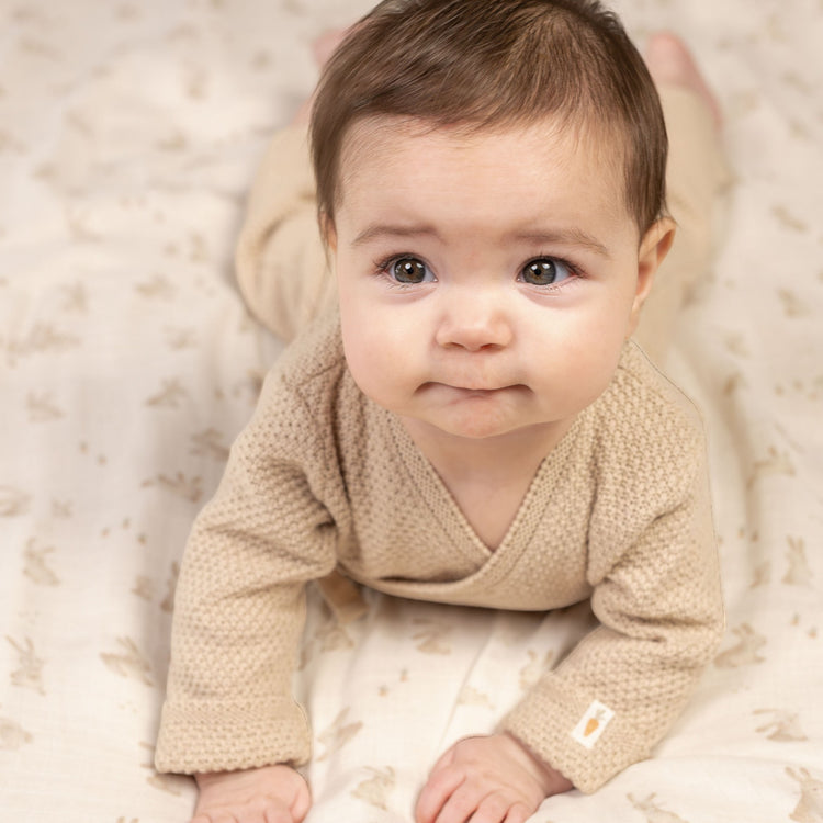 LITTLE DUTCH. Knitted one-piece wrap suit Sand - 68