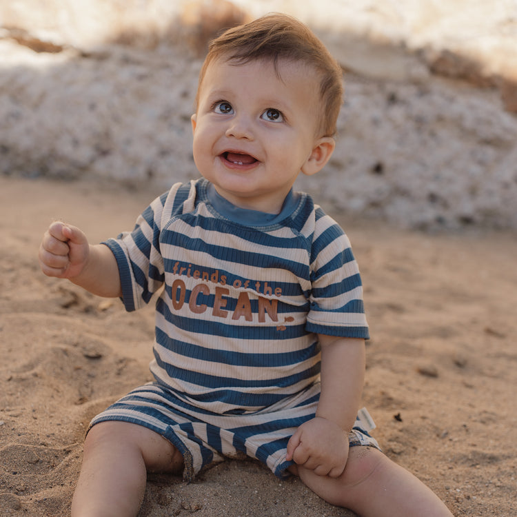 LITTLE DUTCH. Short Sleeve Swimsuit Ocean Blue Stripes