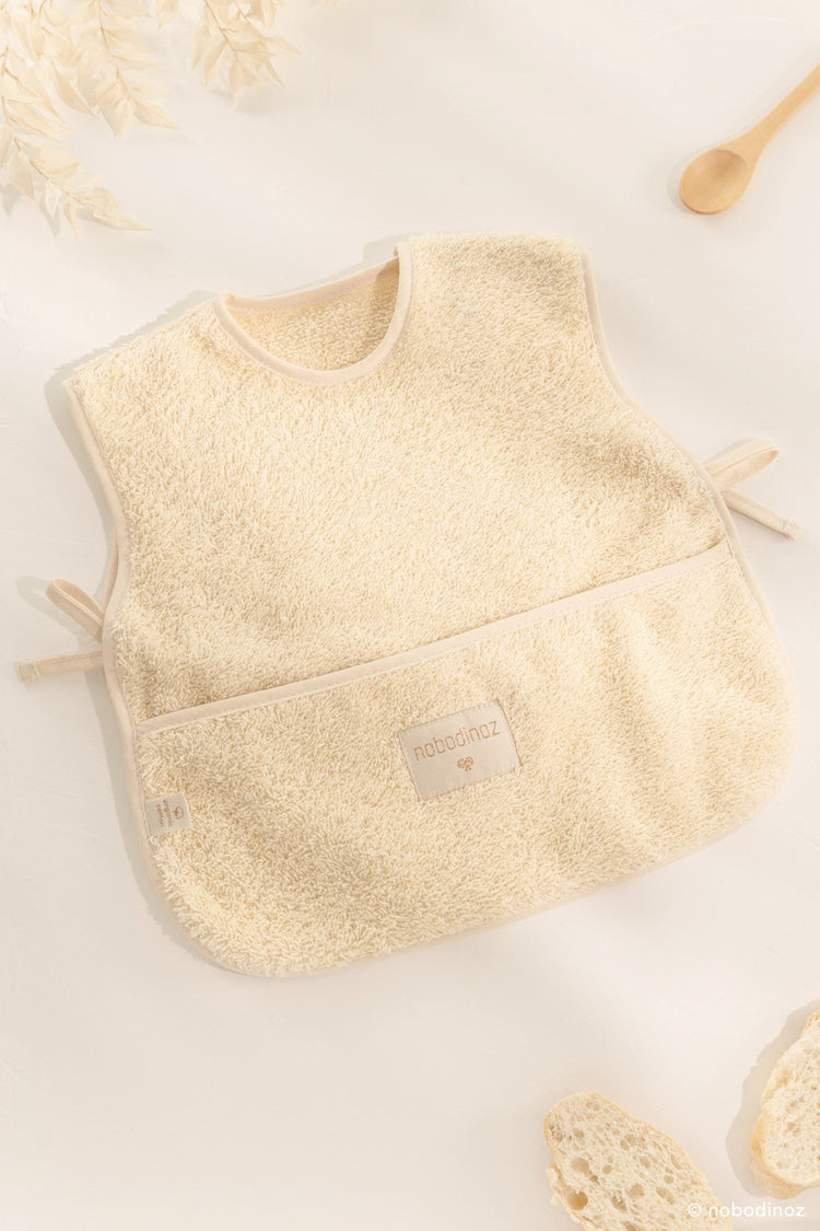 SO CUTE. Σαλιάρα - ποδιά 6-18m Vanilla